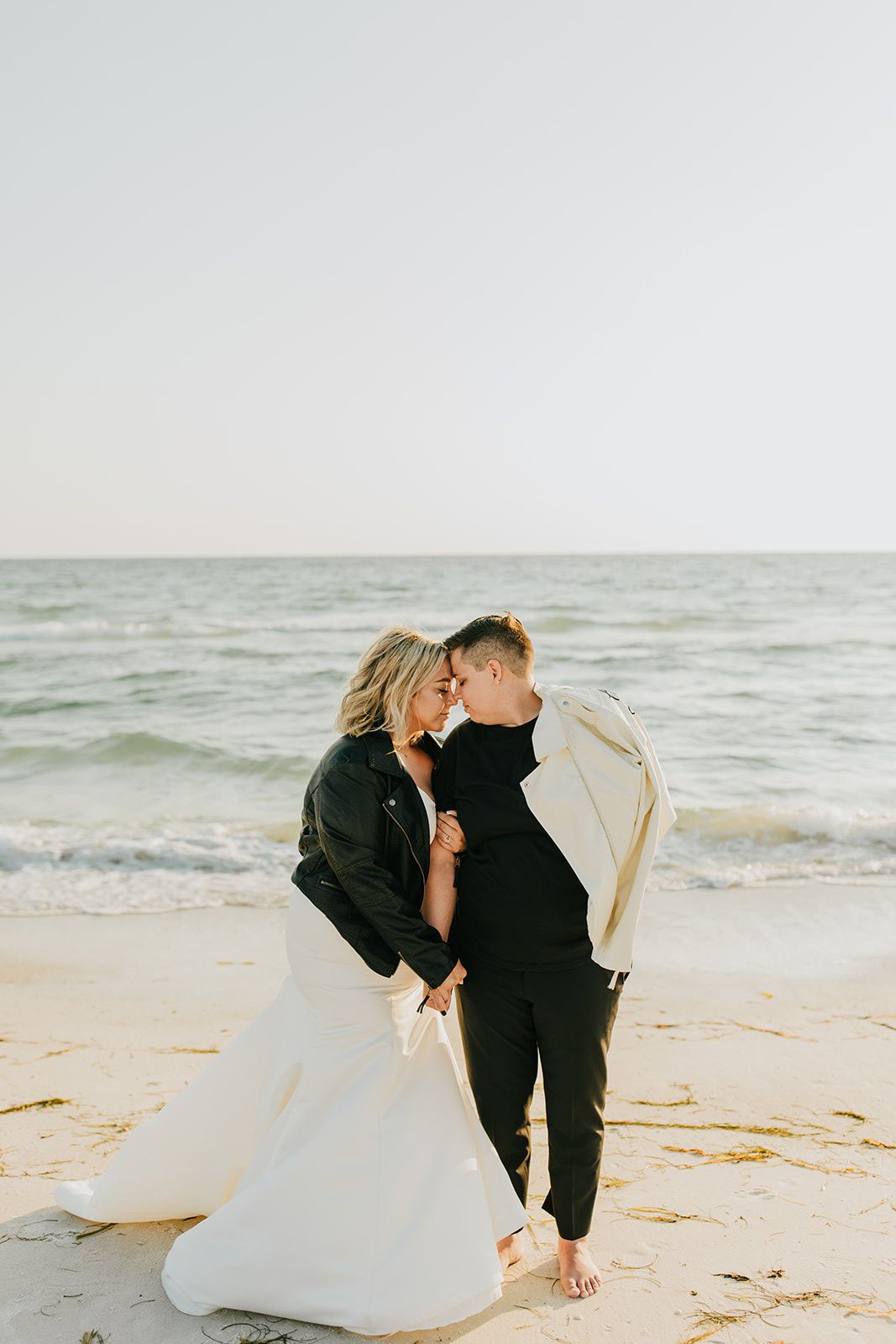 two brides at intimate oceanside wedding