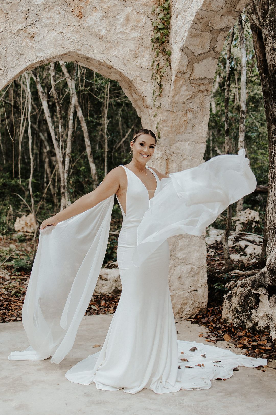 bride twirling in flowing gown
