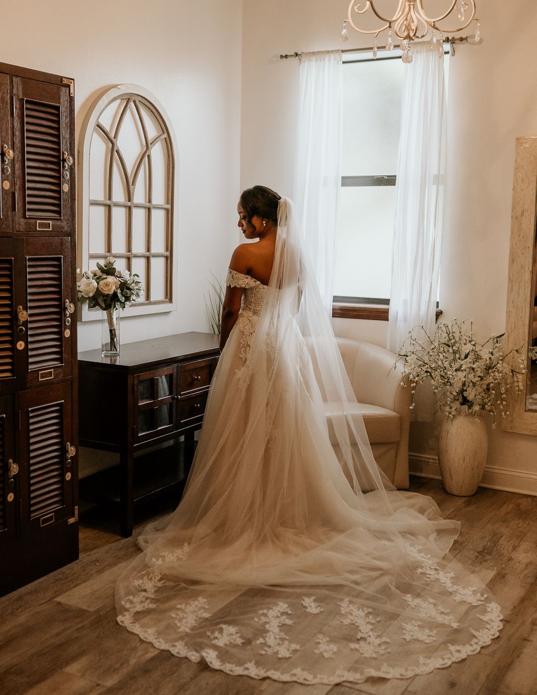 backshot of bride in wedding dress