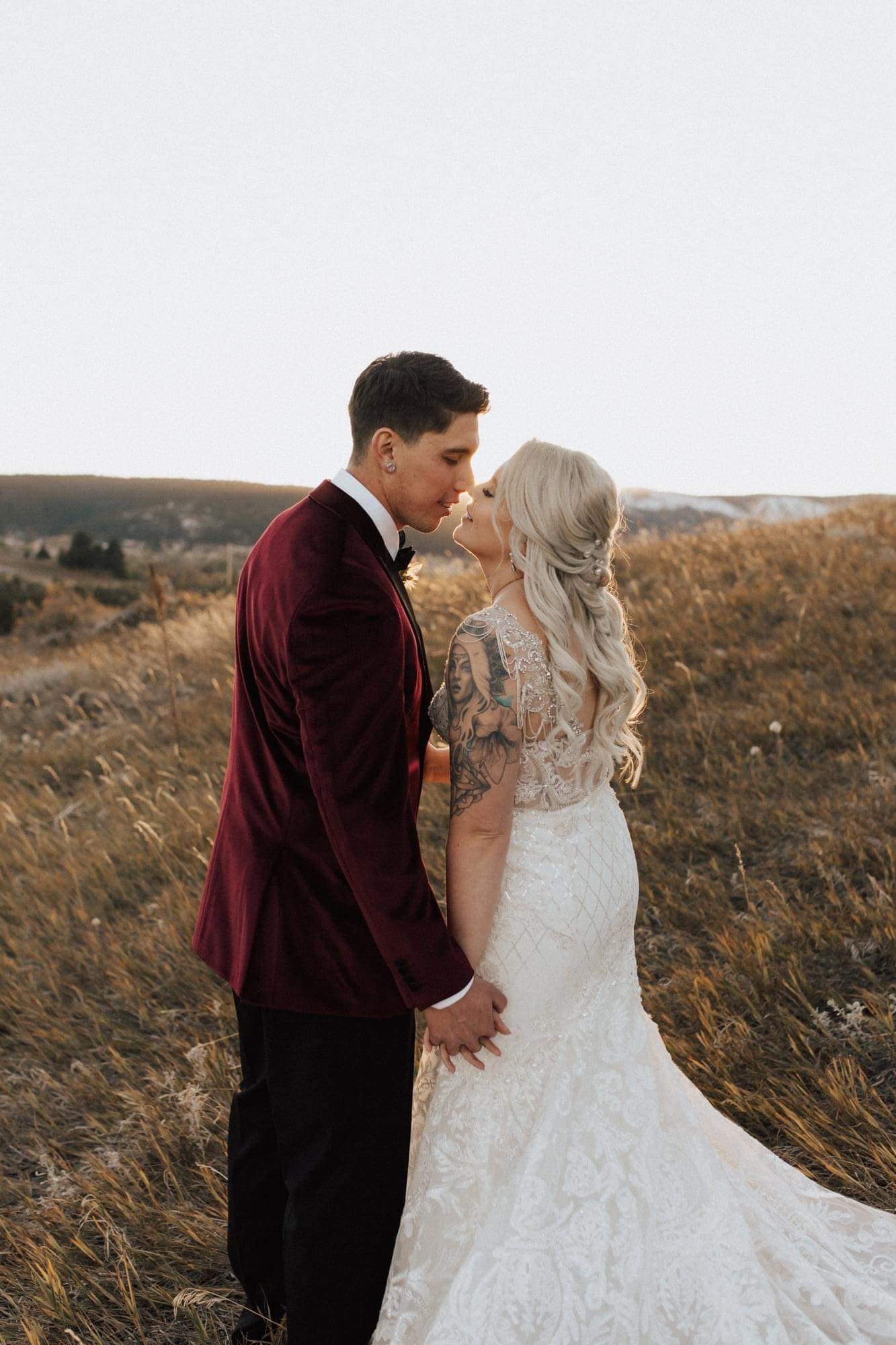 bride and groom at dreamy outdoor fall wedding