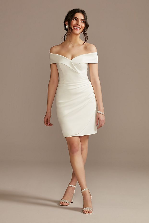 person in modern off-the-shoulder little white dress