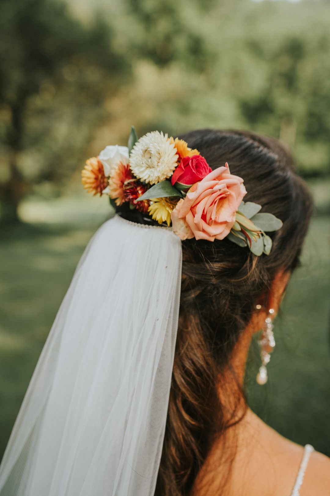 bridal hairstyles with veil and fresh florals