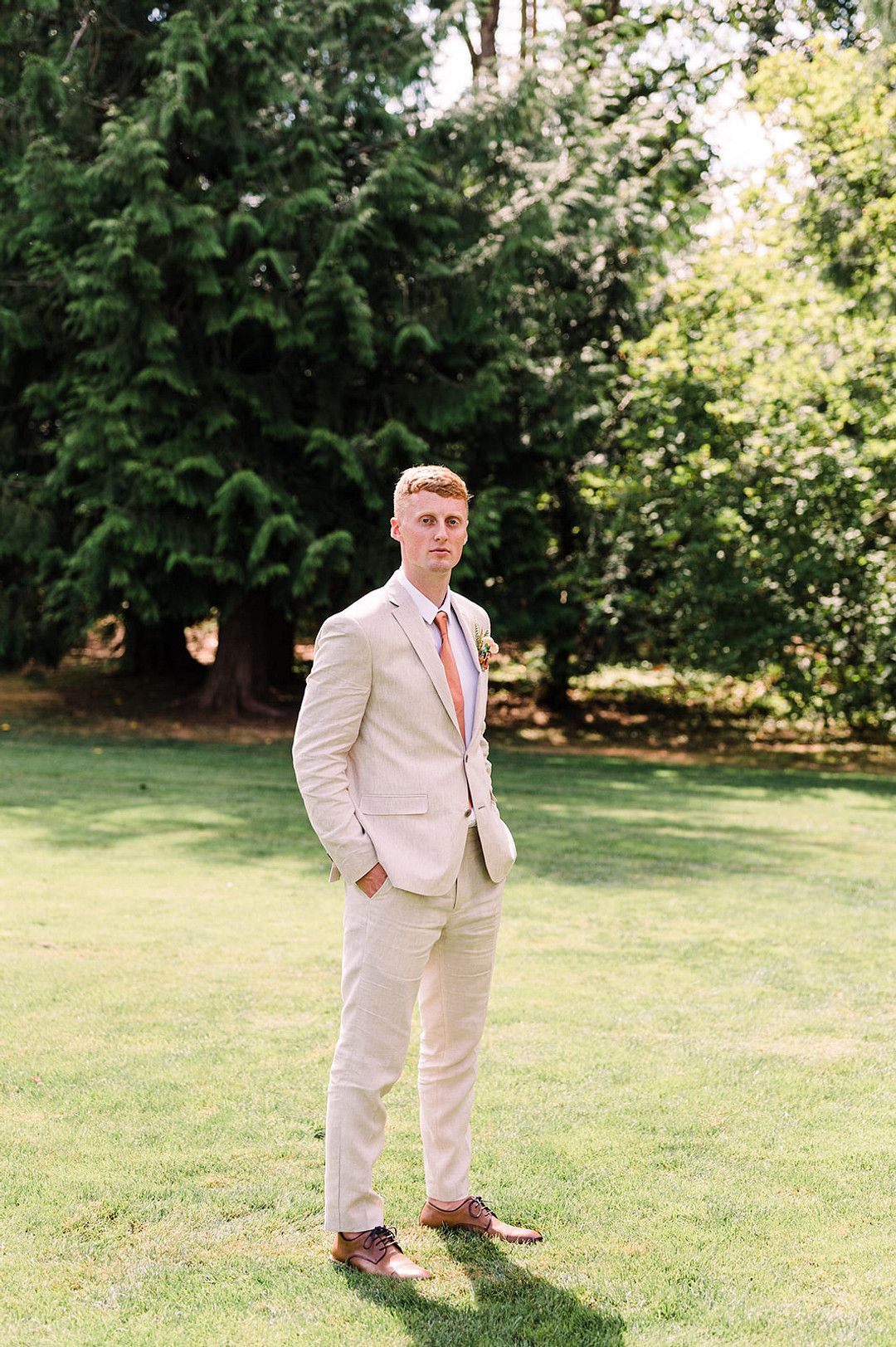 groom in suit at Backyard Wedding in Washington