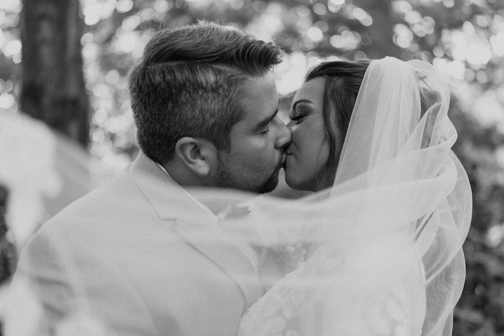 bride and groom kissing at october wedding in tennessee