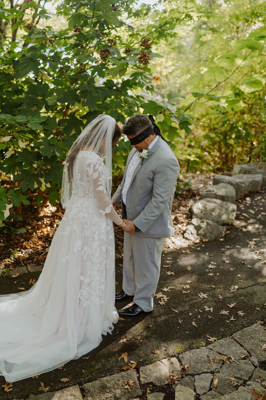 bride and groom first touch at october wedding in tennessee