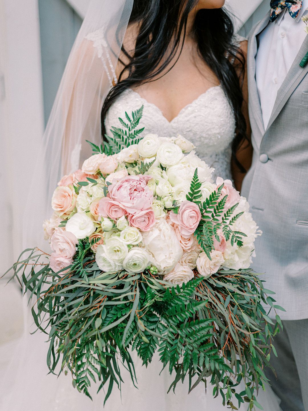 pink and white wedding flowers with greenery