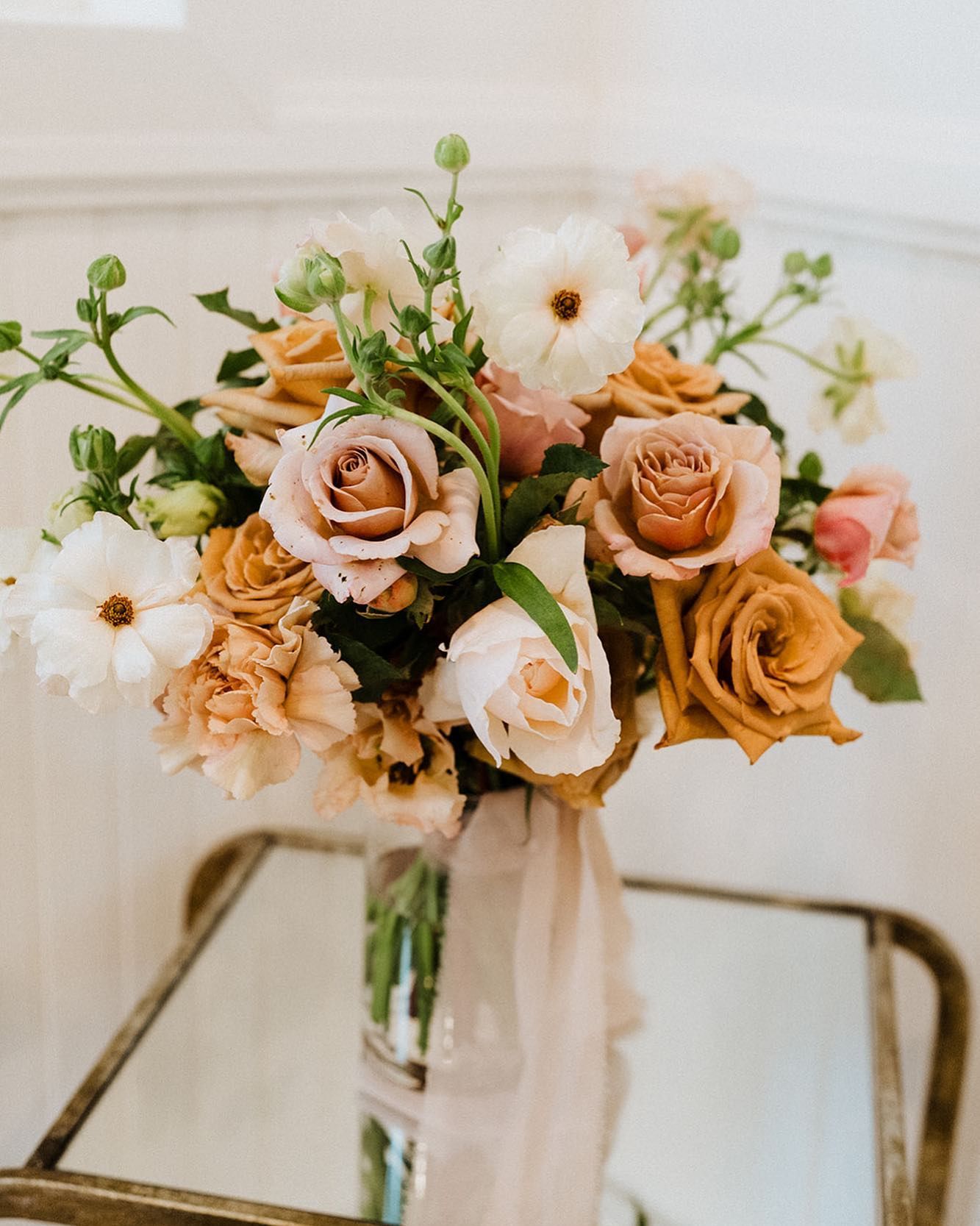pink and orange bouquet of wedding flowers