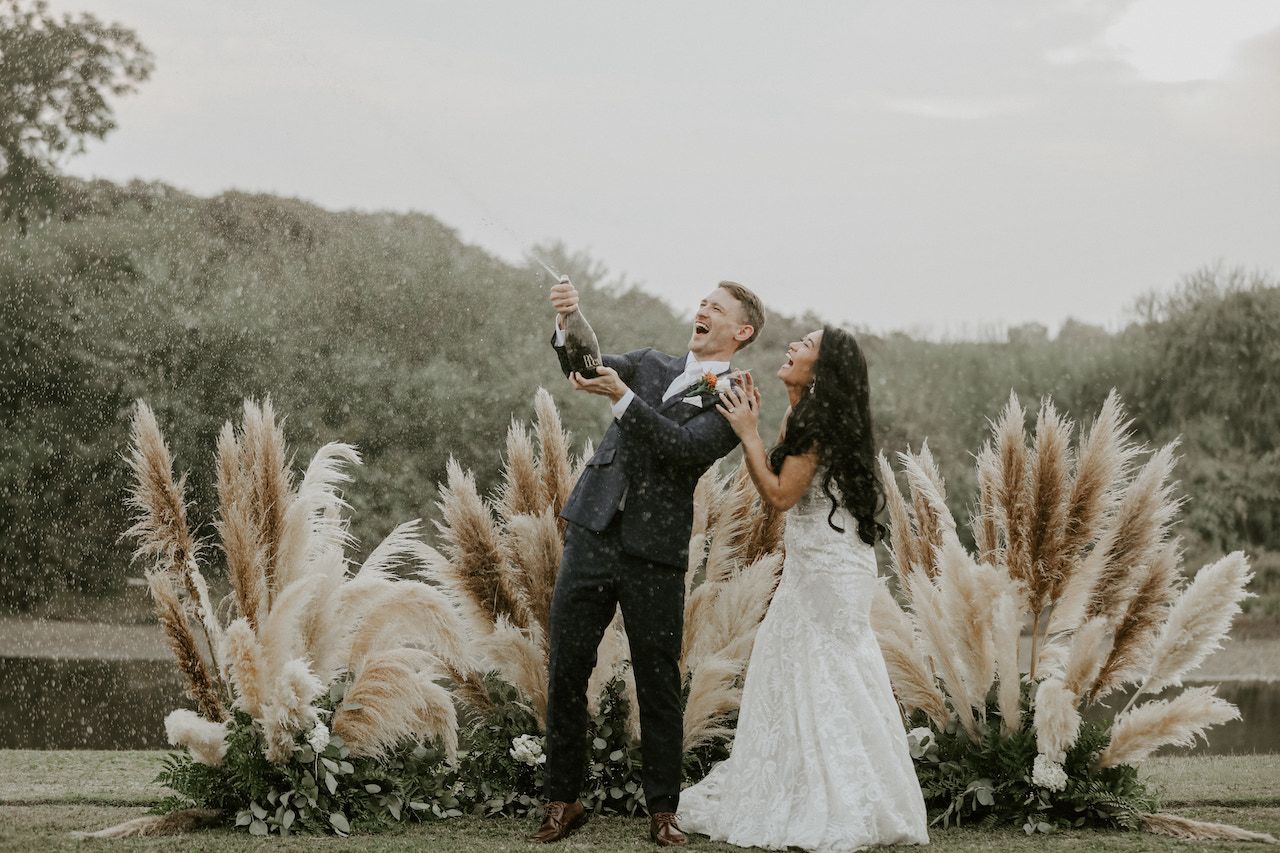 bride and groom celebrating - ranch wedding in california