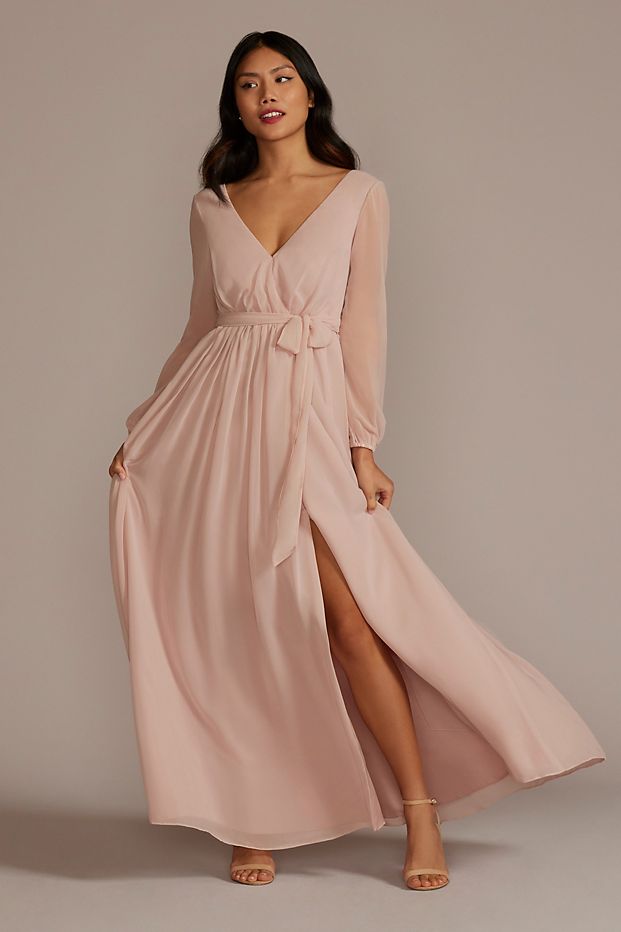 women wearing flowy long sleeve pink bridesmaid dress